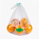 100% organic sticker on bag of oranges