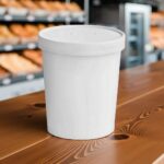 32oz paper cup for soups and other foods on a deli counter with lid on
