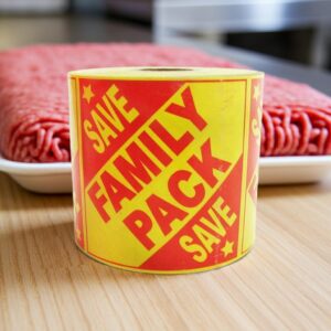promotional Family Pack butcher sticker with save on a yellow and red label