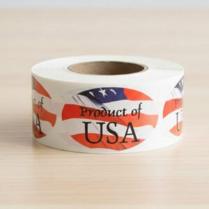 Product of the USA sticker on a roll of labels with a flag design in the background oval