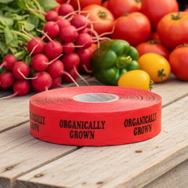 organically grown red sticker on a roll of labels