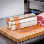 18" meat film roll on a butcher block