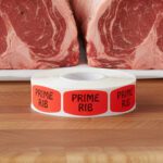 prime rib sticker on a red label with black text