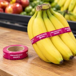 Organically Grown Tape shown on Bananas with Magenta Label Tape