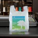 Biodegradable_ Shopping Bags with tree design on counter