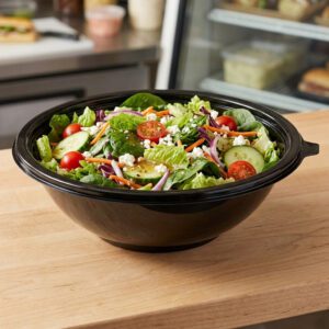 Black Catering Bowl 64oz on deli counter with large salad inside
