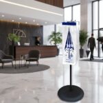 Small wet umbrella bag on a rack in a hotel lobby