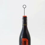 Bottle Top Sign Holder Spiral Sign Clip no background