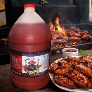 Sparky's Sauce Gallon next to plate of bbq wings