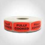 fully cooked label with red background on roll of stickers
