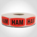 ham label with red background on roll of stickers