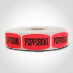 pepperoni pizza label with red background on roll of stickers