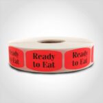 ready to eat label with red background on roll of stickers