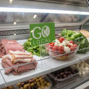 Deli Sign Holder Base 2"W x 2" x 4" shown in a deli container
