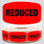 Reduced Label Dayglo Sticker on a roll of 1000 labels, read reduced in black on red sticker