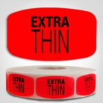 Extra Thin Label Red Dayglo Sticker on a roll of 1000 labels, reads Extra Thin in black print on red label