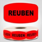 Reuben Label Dayglo Red Sticker on a roll of 1000 permanent adhesive