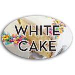 White Cake Label Flavor Oval Sticker with a slice of White Cake Pie pictured in the background with the word White Cake printed on top