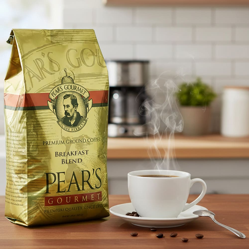 34661 Pear’s Coffee Breakfast Blend 24oz next to a cup of coffee Pear's Coffee Breakfast Blend 24oz next to a cup of coffee