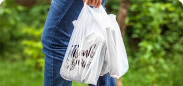 Plastic Carryout Bags being carried