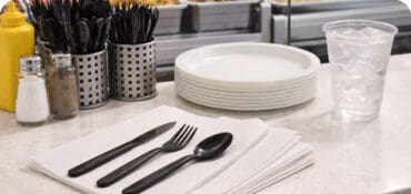 Disposable Utensils Shown on a deli countertop
