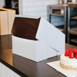 12 inch cake box with cake next to it