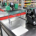 Shopping Bag Rack in chrome shown at checkout counter