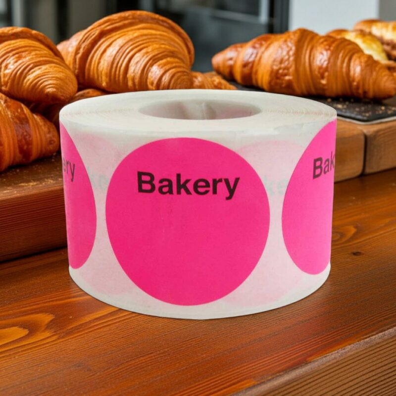 pink round sticker label with bakery printed on the top and room to write below it