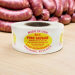 Bulk Pork Sausage Oval label on a roll of white sticker with yellow background and red text
