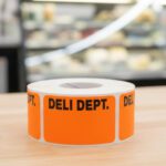 deli department sticker on a rectangle orange label