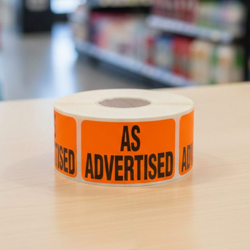 500440-As-Advertised-Label-Stickers As Advertised sticker on a rectangle orange label with black text