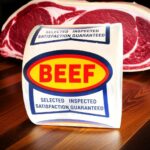 ribbon beef sticker on roll of labels reads beef and selected inspected satisfaction guaranteed