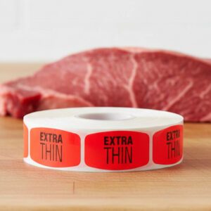 extra lean sticker on a red label with black print