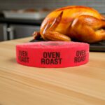 oven roast sticker on a red label with black text