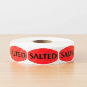 salted sticker on a red label with black text