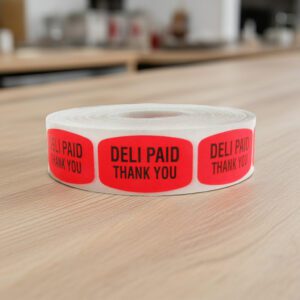 deli paid thank you sticker on a red label with black print