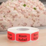 ham salad sticker on a red label with black print