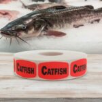 catfish sticker on a red label with black print