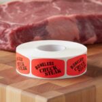 boneless chuck steak sticker on a red label with black print