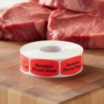 boneless round steak sticker on a red label with black print
