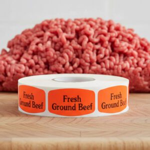 fresh ground beef sticker on a red label with black print