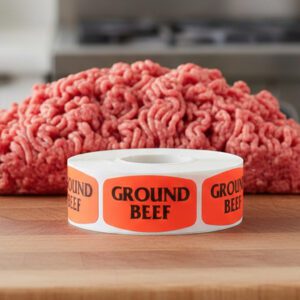 ground beef sticker on a red label with black print