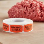 ground chuck sticker on a red label with black print
