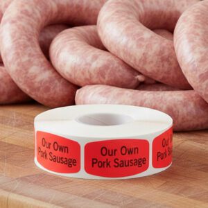 our own pork sausage sticker on a red label with black text