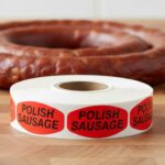 polish sausage sticker on a red label with black text
