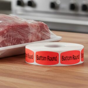 bottom round sticker on a red label with black print