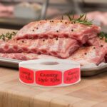 country style ribs sticker on a red label with black print