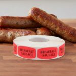 breakfast sausage sticker on a red label with black print