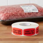 family pack ground beef sticker on a red label with black print