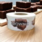 brownie label showing a brownie on a roll of stickers